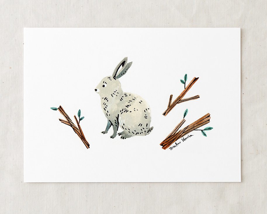 a 5x7 nursery watercolor art painting print of a white and gray bunny rabbit sitting and three leafy twigs