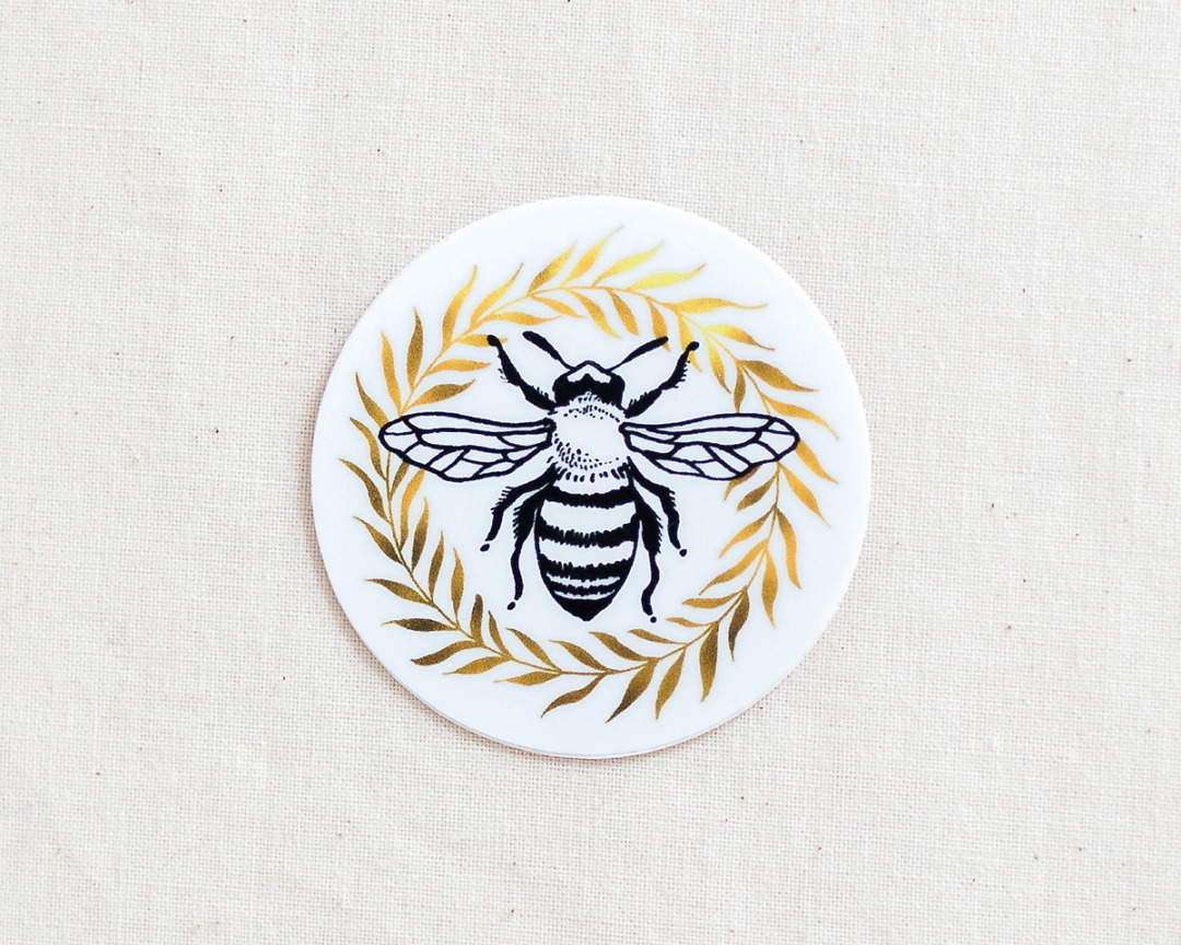 cute honey bee and wreath vinyl sticker by wildship studio